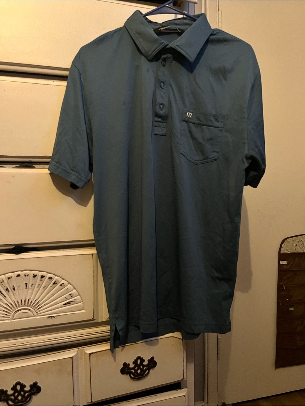 Travis Mathew Short Sleeve Polo in Teal Blue